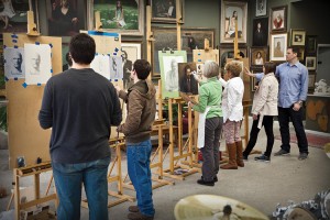 Students inside Ryan S. Brown's studio and academy .