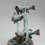 William Carrington, Chasing Bait, bronze, 24 x 13.