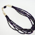 Albert Lee (Diné), sterling silver sugilite five-strand beaded necklace.